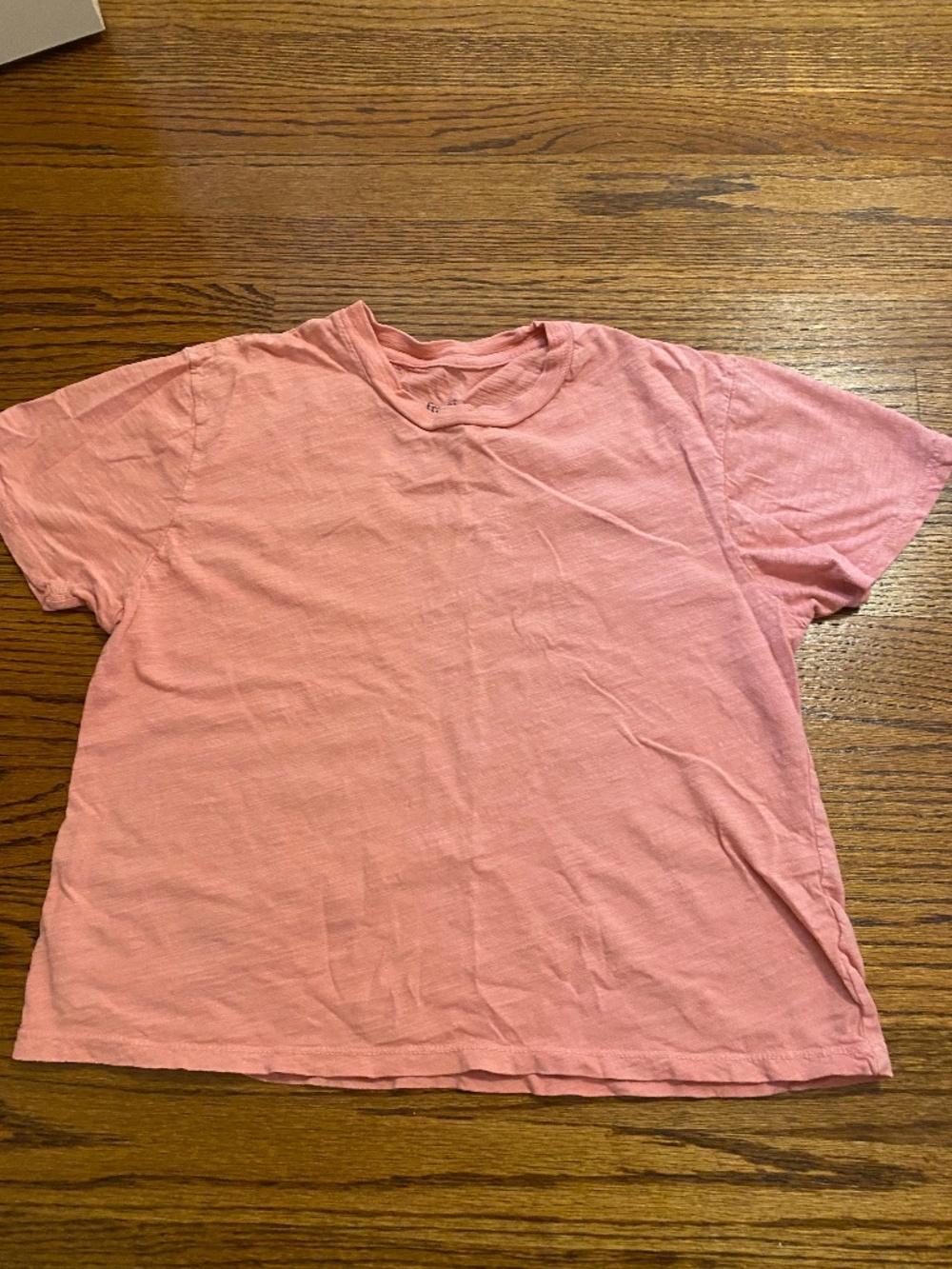 Francesca’s pink T-shirt